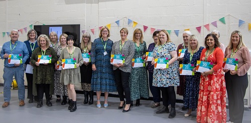 Image for Vibrant celebration for long serving college employees